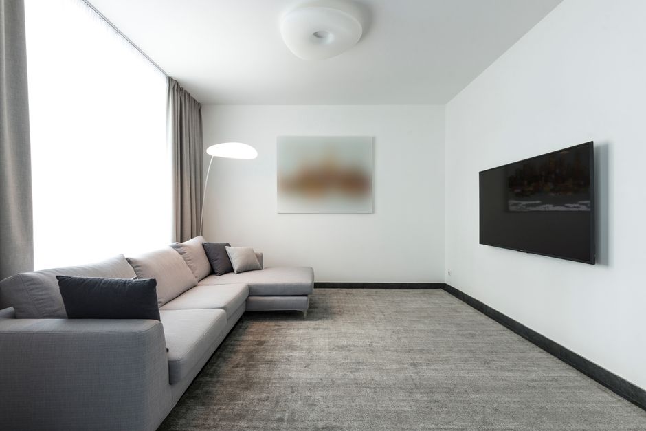 Clean living room carpet showcasing professional carpet cleaning results